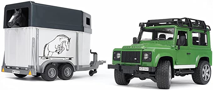 land rover defender con rimorchio e cavallo