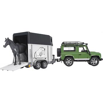 land rover defender con rimorchio e cavallo