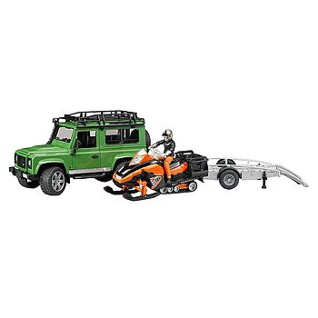 Land Rover Defender Station con motoslitta